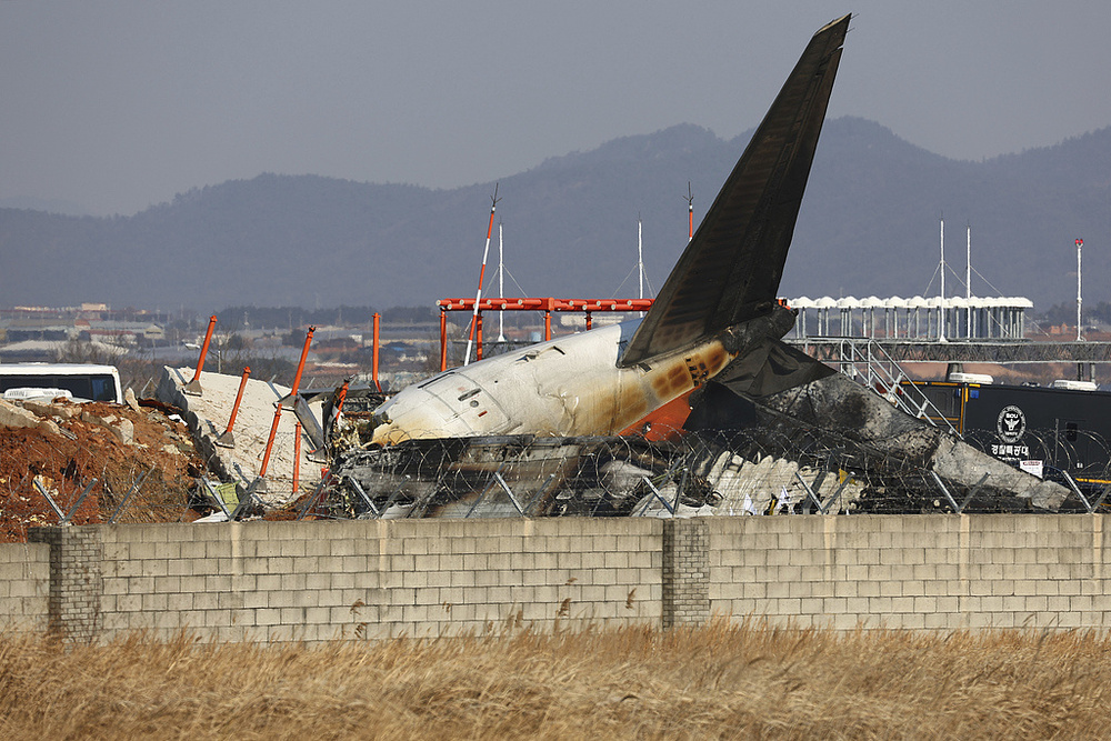 韩国客机起火已致58人死亡